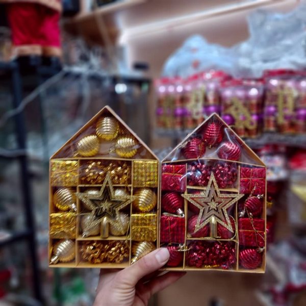 پک طلایی قرمز کریسمس گوی ستاره سر درخت جعبه هدیه و انواع آویز مدل لاکچری niker toy