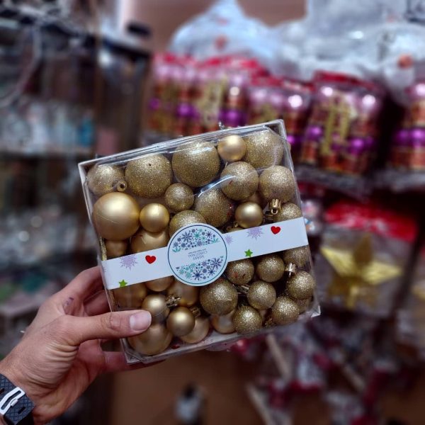 پک گوی 6 سانتی طلایی کریسمس گوی ستاره سر درخت جعبه هدیه و انواع آویز مدل لاکچری niker toy